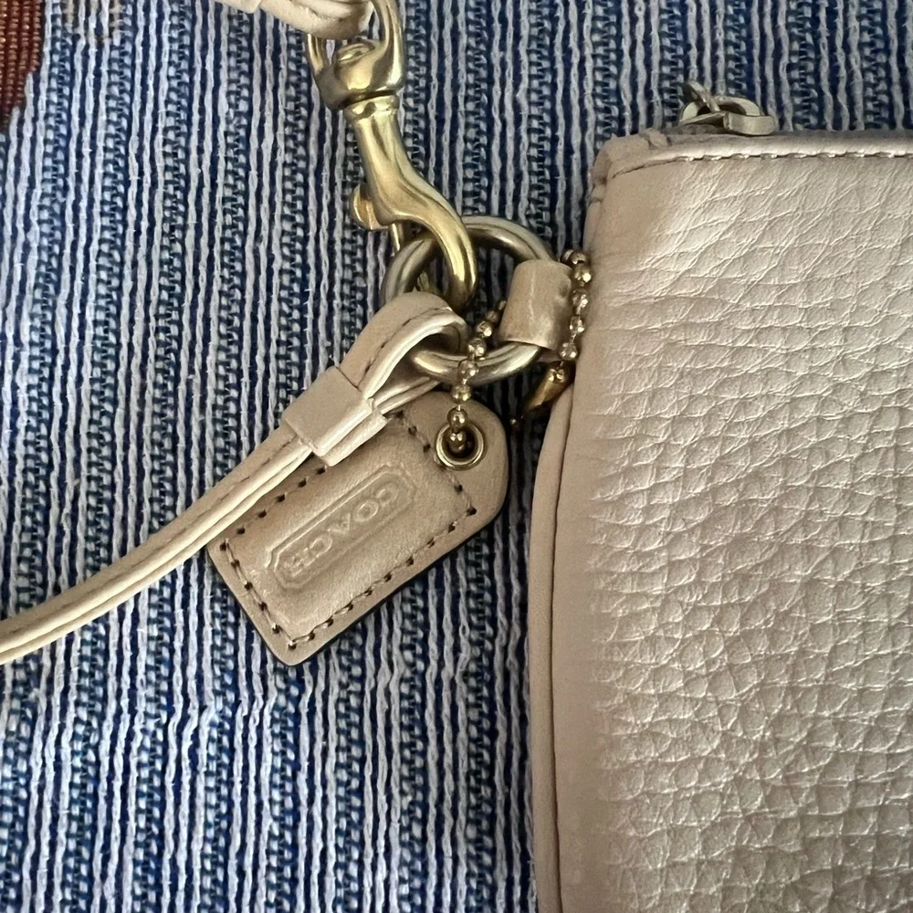 Coach Cream Pebbled Leather Wristlet with Gold-Tone Hardware